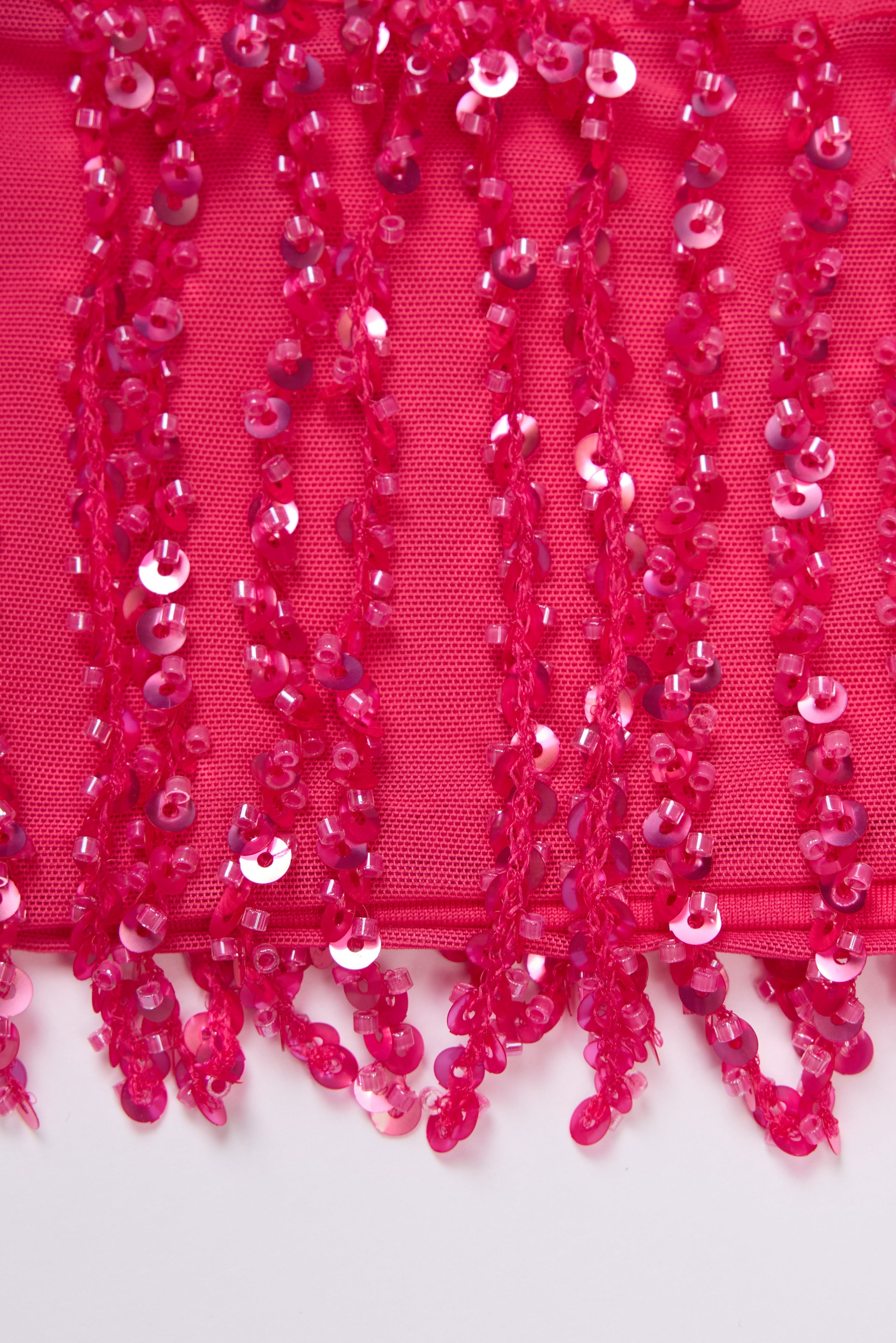 Fringed Low-Rise Mini Skirt in Raspberry